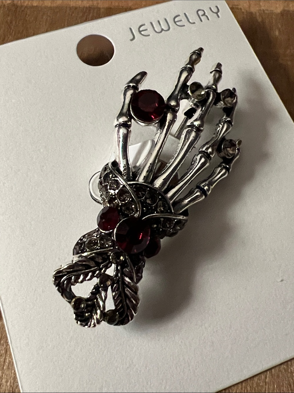 3/$18 Vintage-Inspired Silver Skeleton Hand Brooch with Deep Red Stones Lot 6077